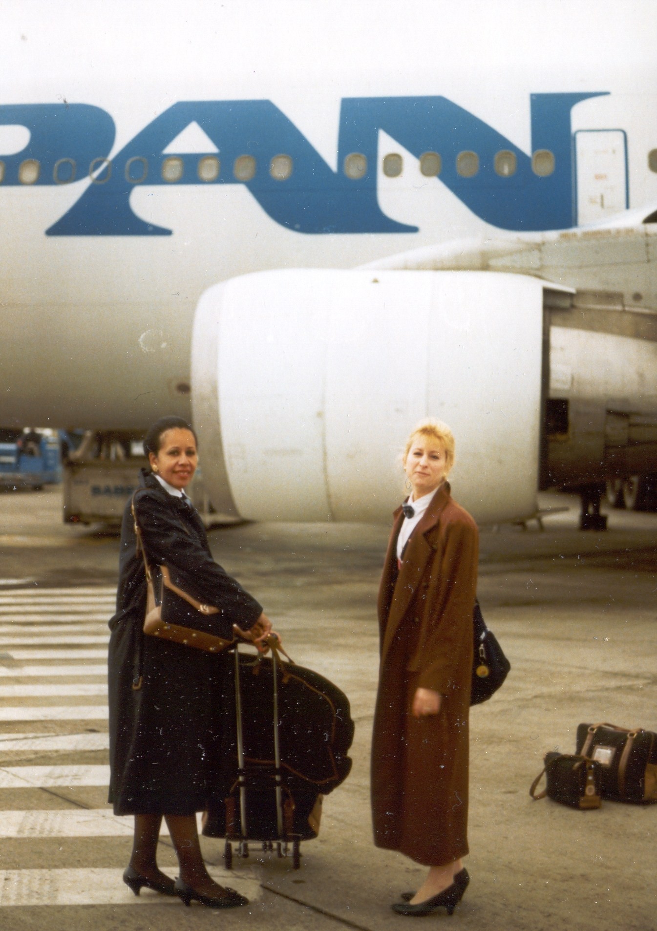 1991 Brussels, Two Pan Am Flight Attendants pose by an Airbus A310 aircraft prior to returning to New York. returning to NYC.  Beverly is the first name of the Flight Attendant on the left.